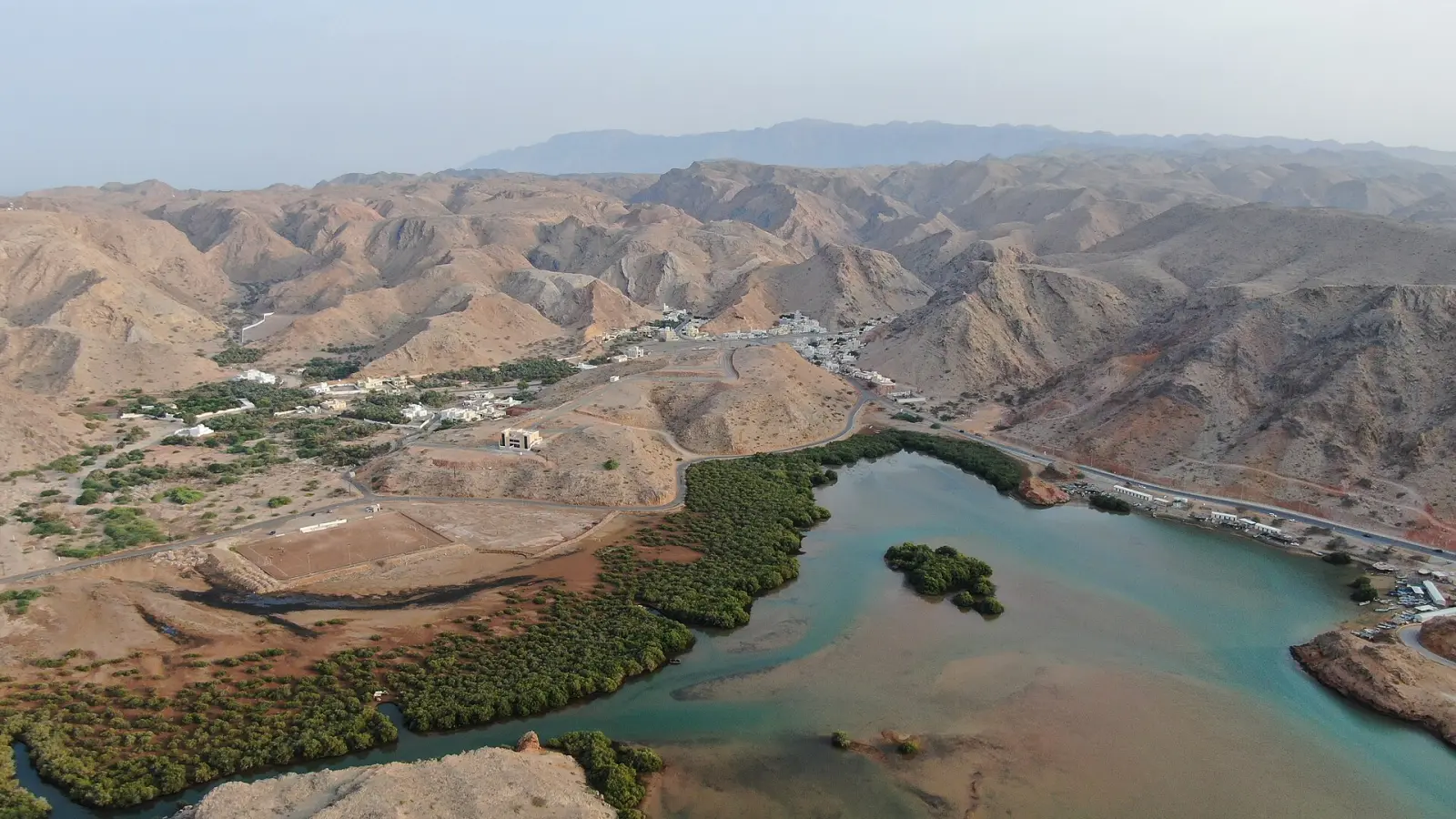 Aerial view of a lagoon and mountains near Muscat