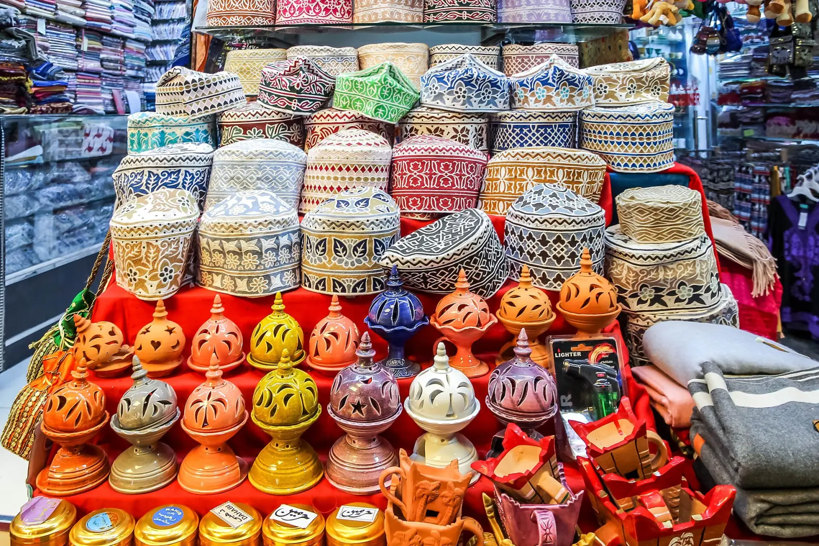 Omani caps and lanterns in a souq