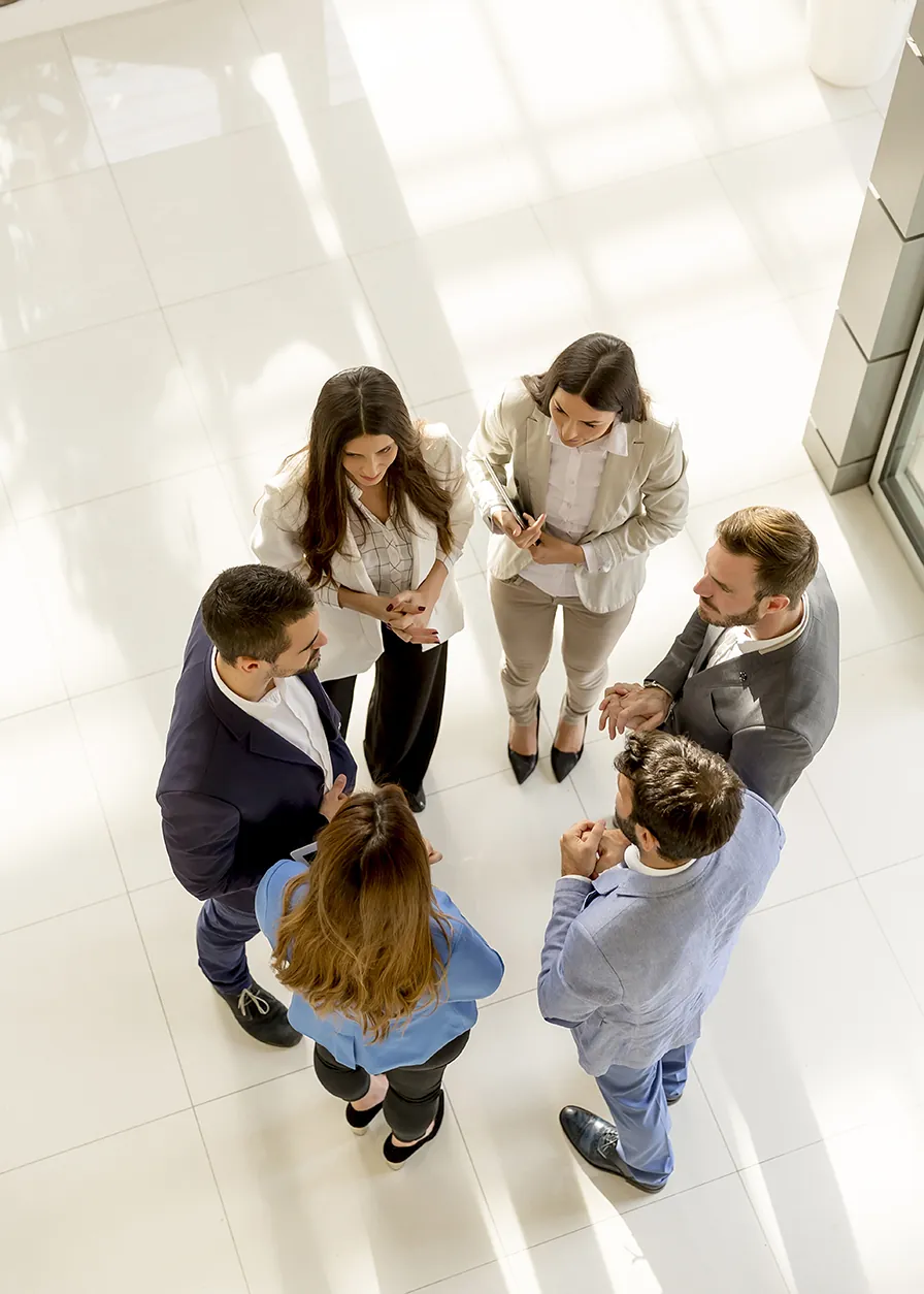 Business setup advisers meeting with clients in an office